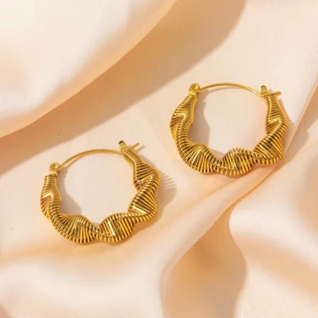 Brincos Aurum Torquent